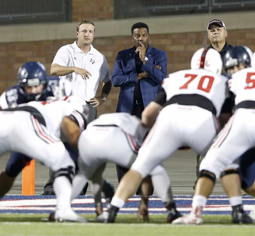 Texas A&M football head coach Kevin Sumlin watches a high school football game between Allen...