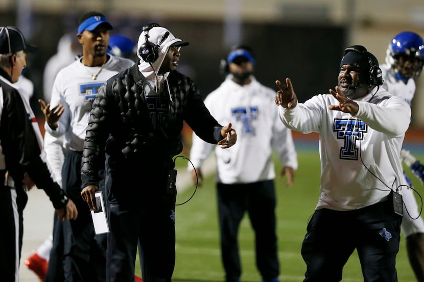 Trinity Christian's head coach Andre' Hart and offensive coordinator Deion Sanders question...