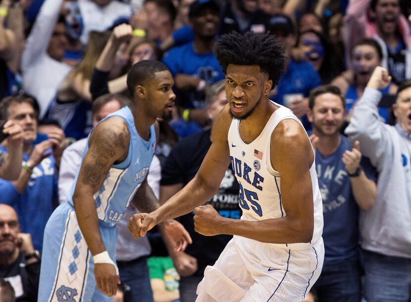 FILE - In this March 3, 2018, file photo, Duke's Marvin Bagley III (35) celebrates after a...