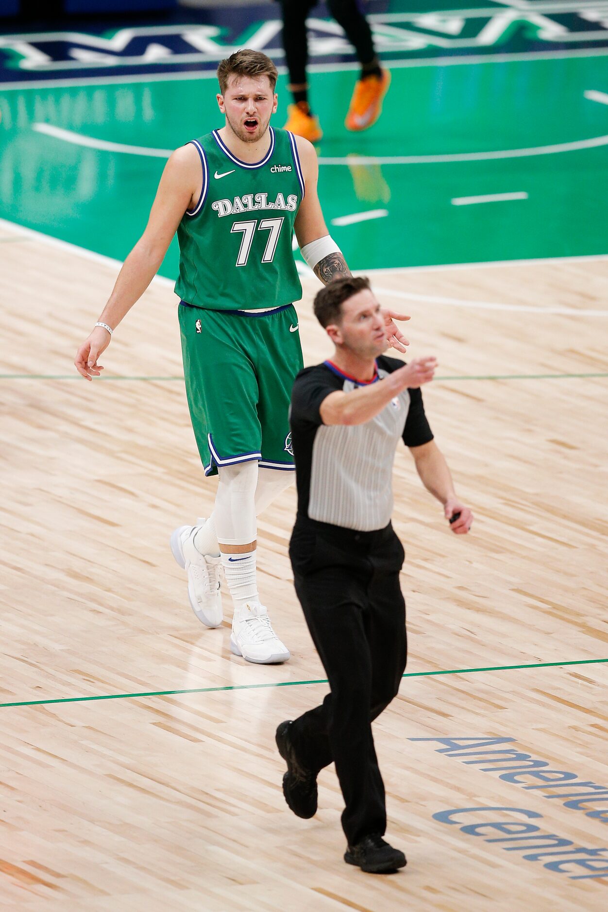 Dallas Mavericks guard Luka Doncic (77) reacts to a call against him during the first half...