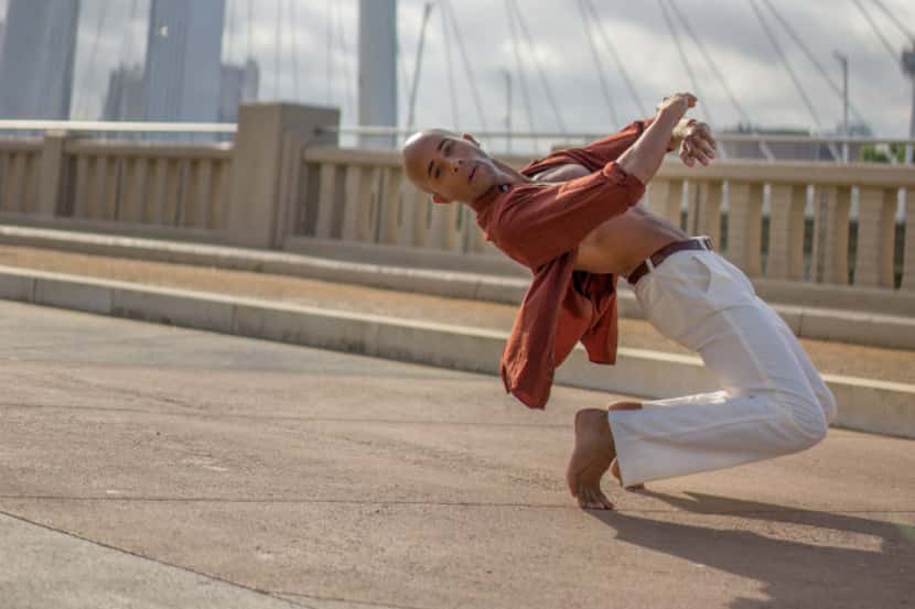 Dancer-choreographer Sean J. Smith strutting his stuff on the Margaret Hunt Hill Bridge.