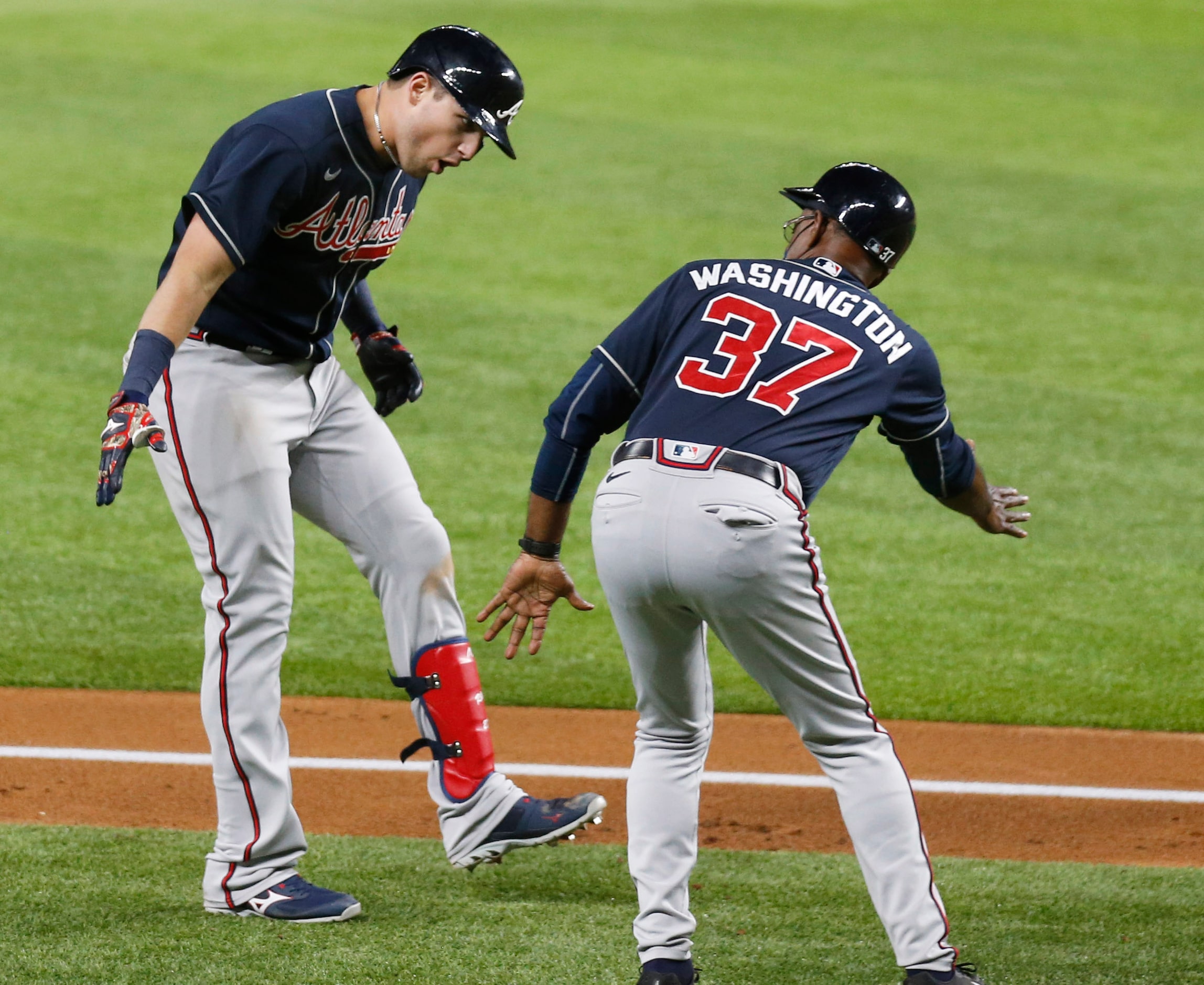 Atlanta Braves third baseman Austin Riley (27) celebrates with Atlanta Braves third base...