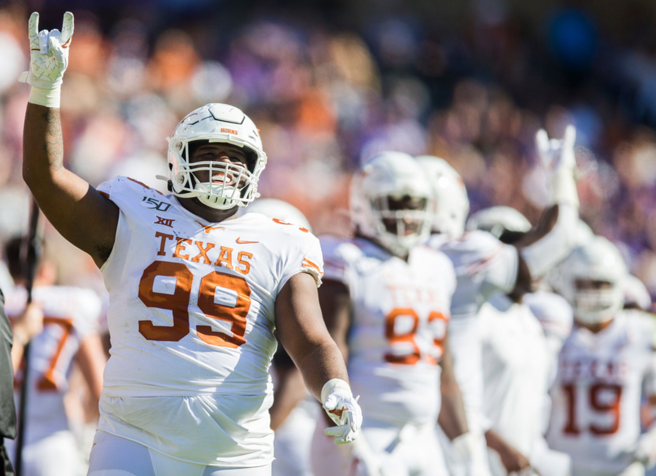 Texas Longhorns defensive lineman Keondre Coburn (99) celebrates after the Longhorns...