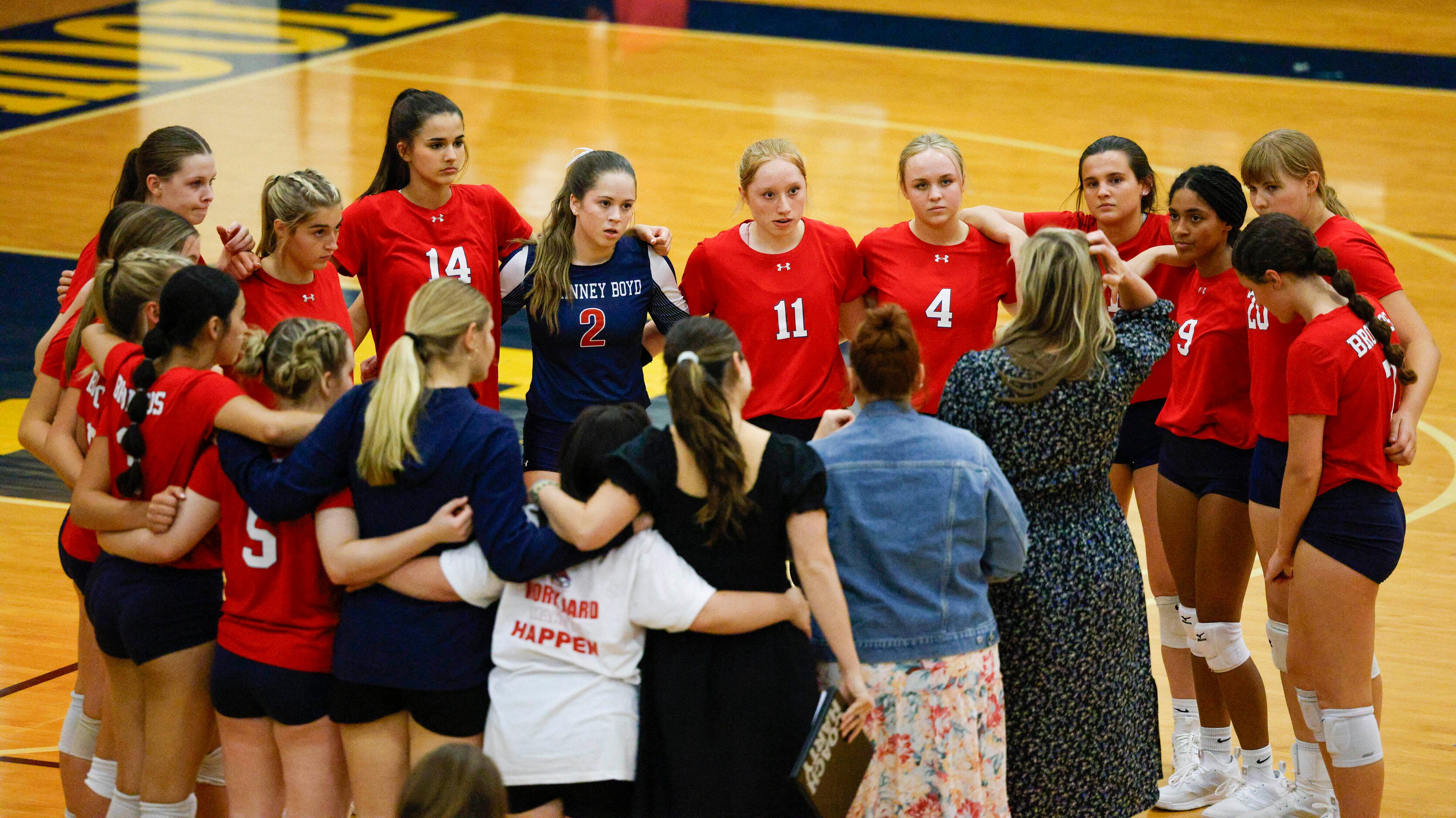 The McKinney Boyd team listens to head coach JJ Castillo during a volleyball match against...