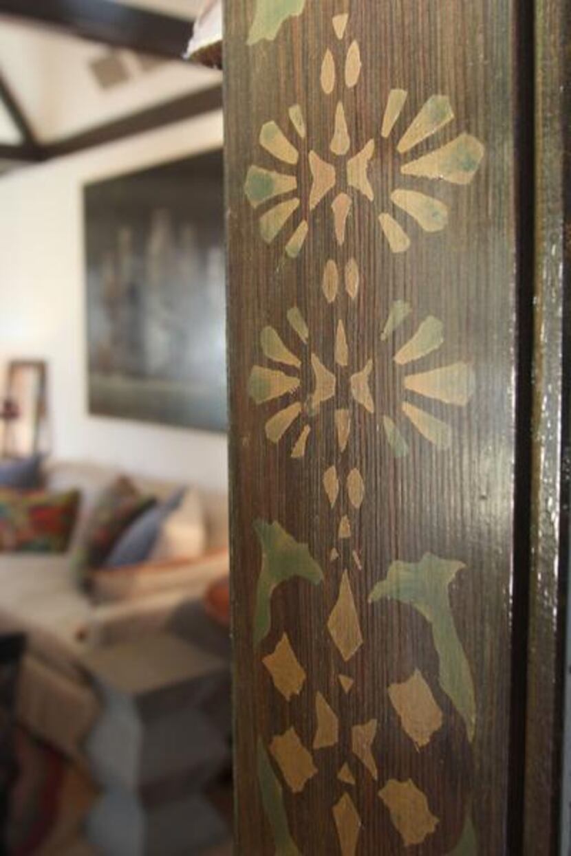 
The original stenciled pattern on the beams and door frame instantly convinced Williams the...