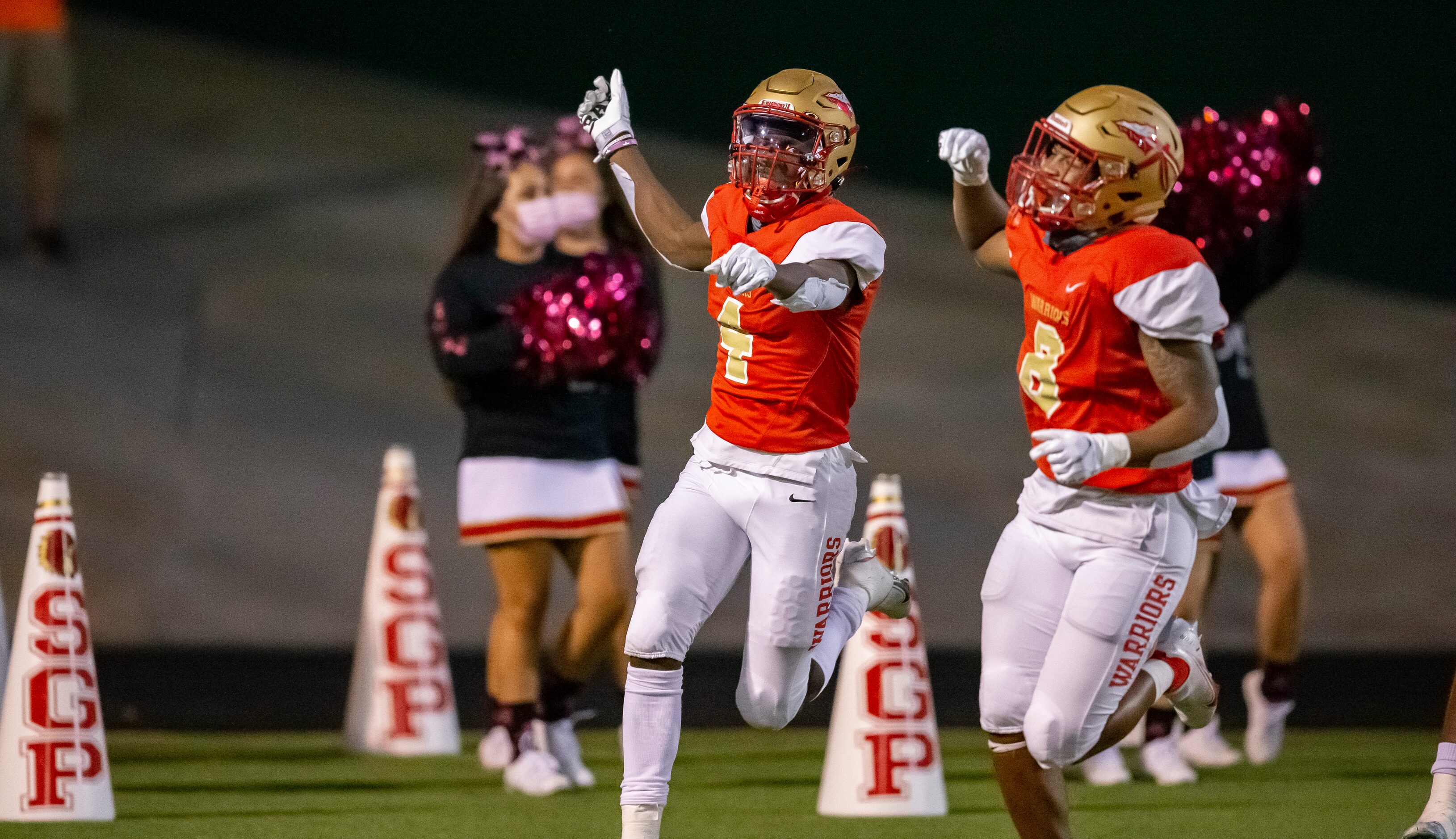 South Grand Prairie senior wide receiver Josh Nicholson (4) celebrates scoring a touchdown...