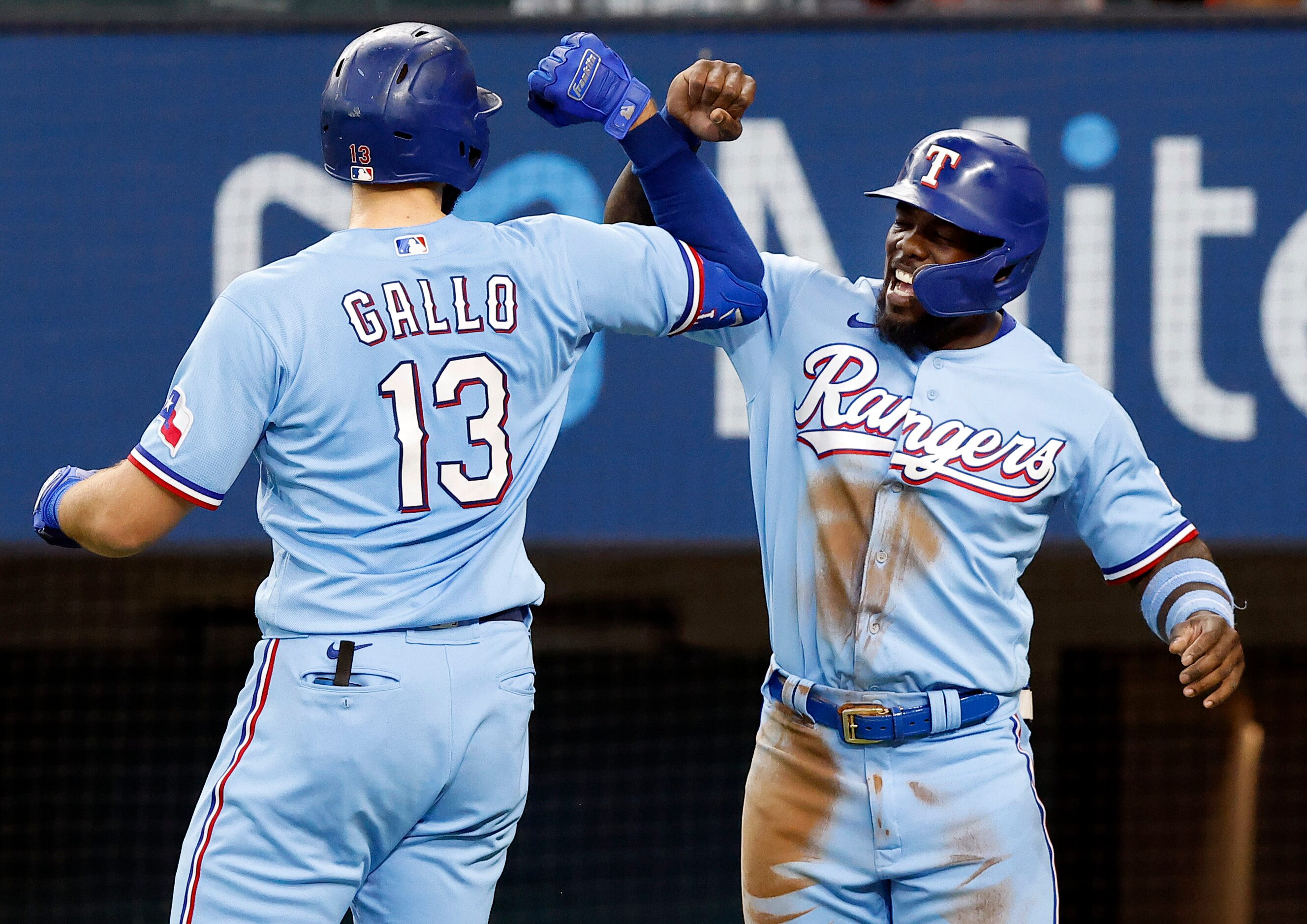 Texas Rangers batter Joey Gallo (13) is congratualted by Adolis Garcia after connected on a...