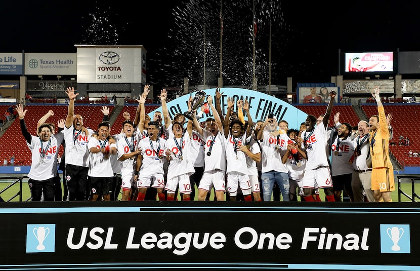 North Texas SC hoists the 1st ever USL League One Final trophy at Toyota Stadium, October...