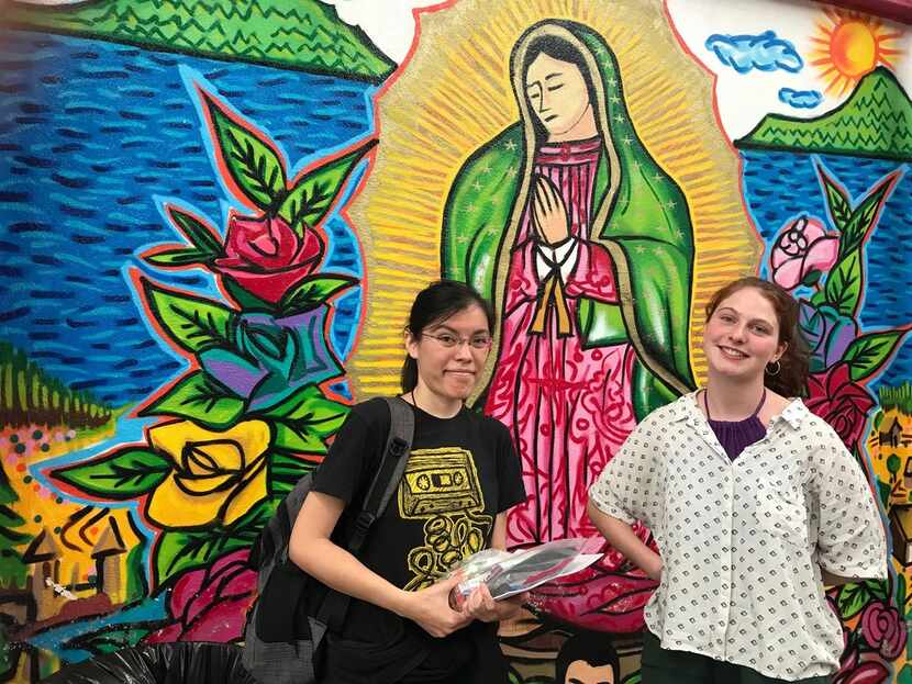 Volunteers Melanie Nayeli Wieschalla (left) and Lola Fleming help Central Americans with...