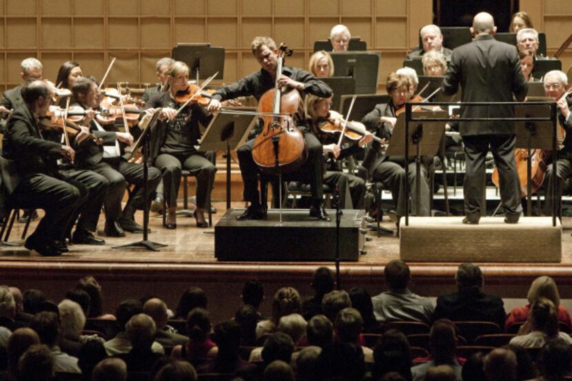 Cellist Johannes Moser (center) played with a tone of sometimes astonishing volume in...