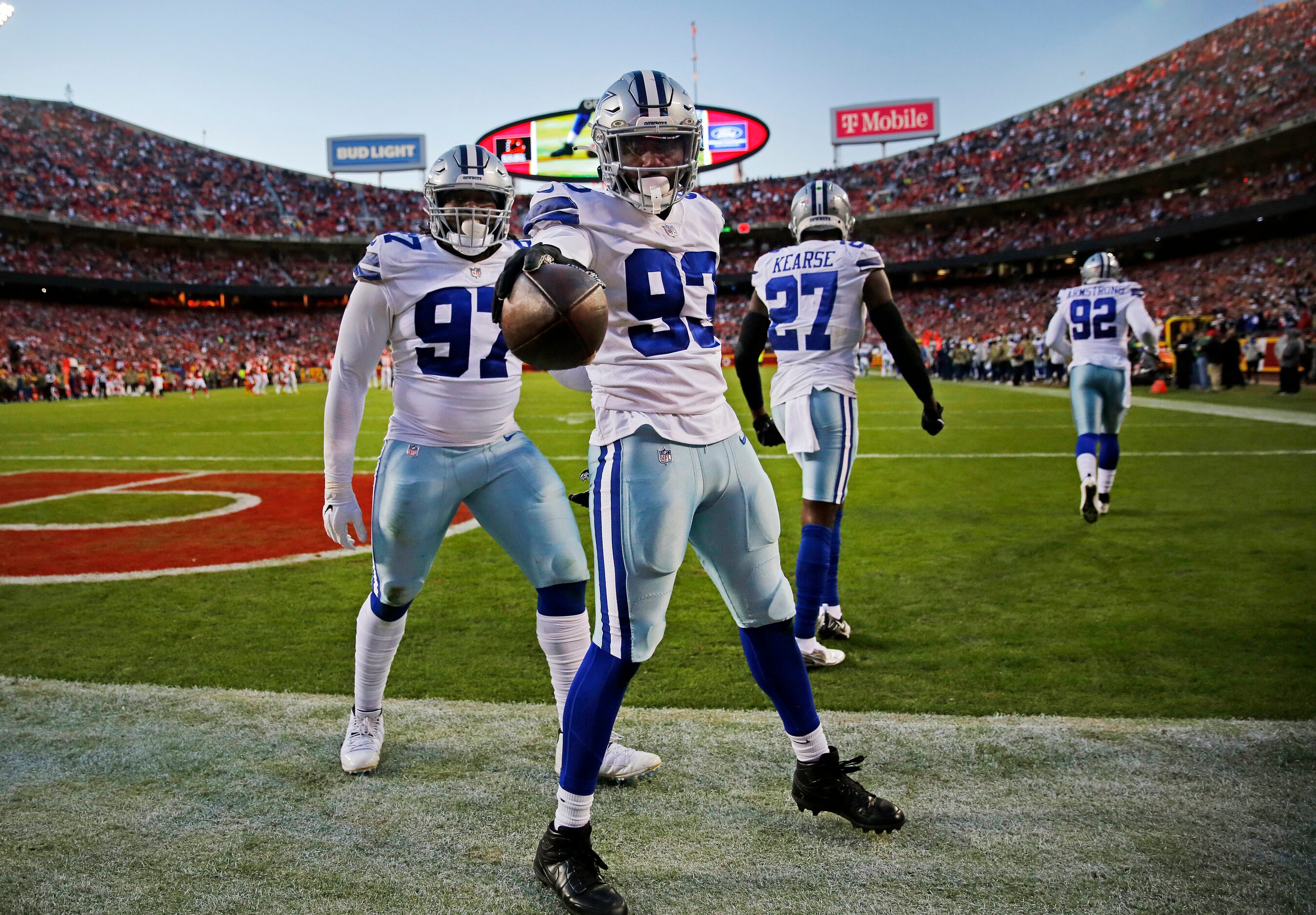 Dallas Cowboys defensive end Tarell Basham (93) shows off his fumble recovery of Kansas City...