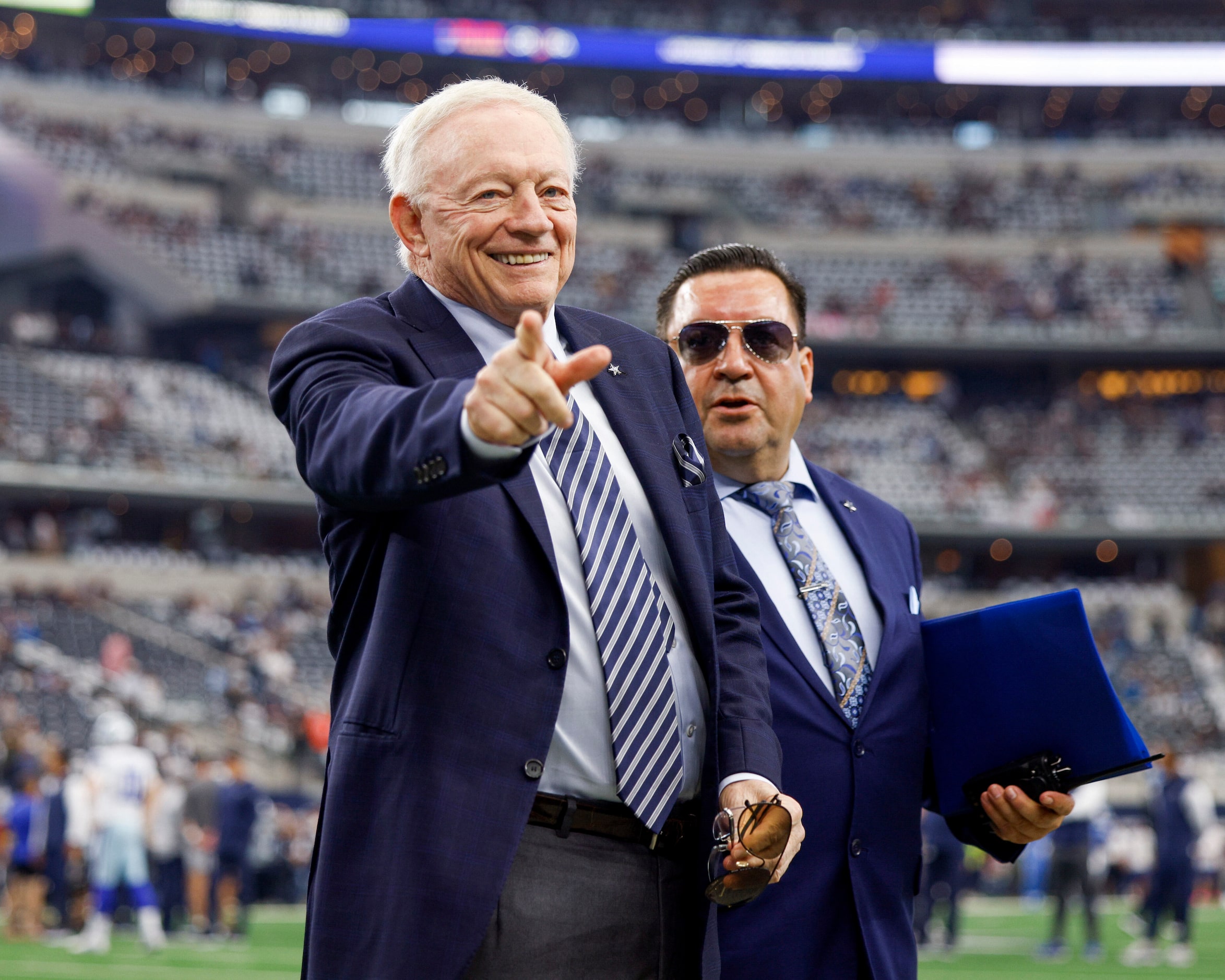 Dallas Cowboys Jerry Jones walks the field before a NFL game against the Detroit Lions at...