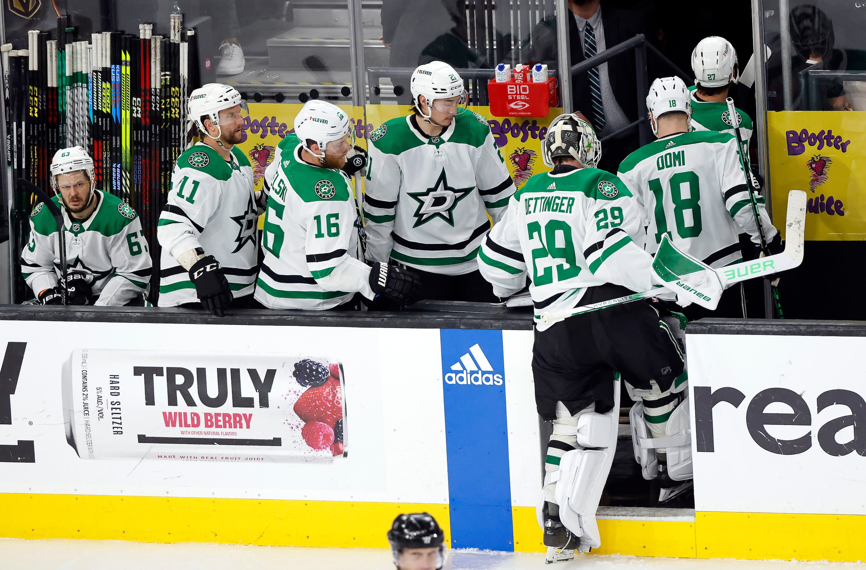 Dallas Stars goaltender Jake Oettinger (29) and his teammates head to the locker room after...