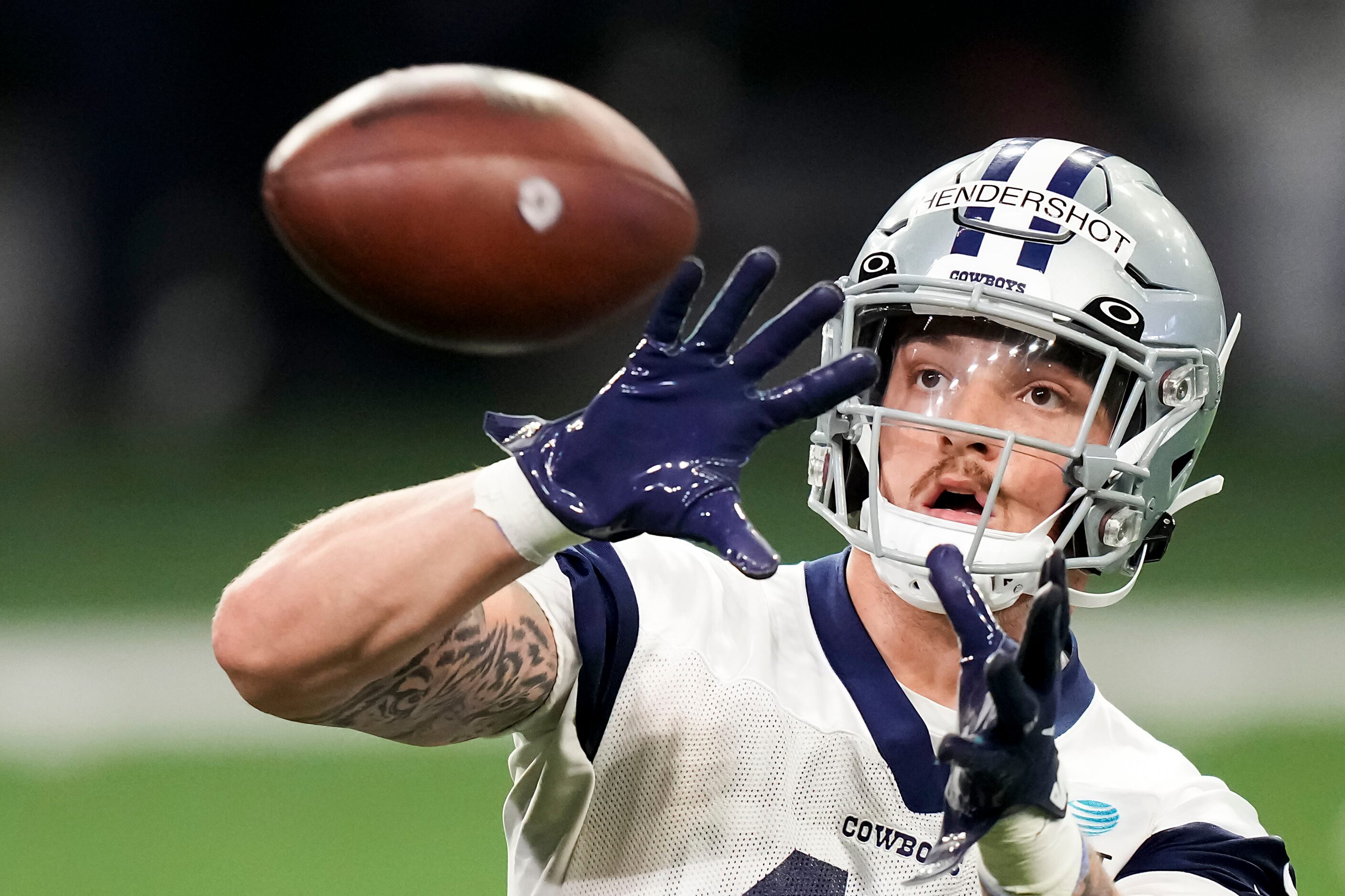 Dallas Cowboys tight end Peyton Hendershot catches a pass during the OTA team's practice at...