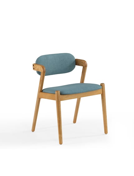 Jonathan Adler's Now House collection features a mid-century dining chair in light wood with...