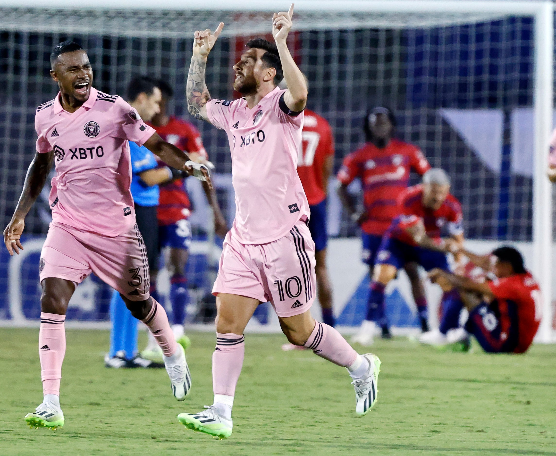 Inter Miami midfielder Dixon Arroyo (3) congratulates forward Lionel Messi (10) after he...