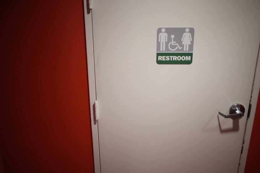 (FILES) This file photo taken on May 5, 2016 shows a gender neutral bathroom seen in...