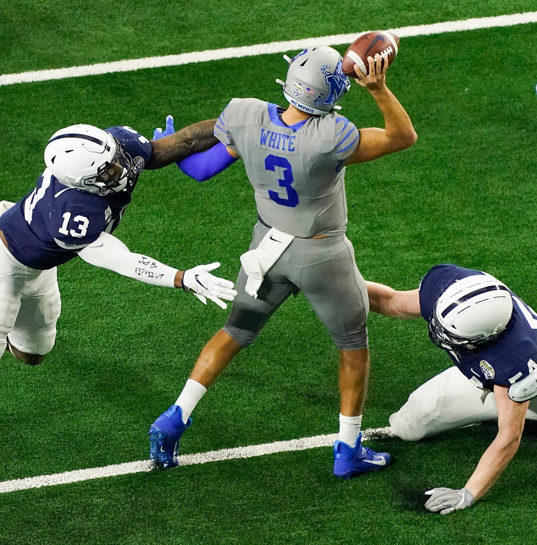 Penn State linebacker Ellis Brooks (13) and defensive tackle Robert Windsor (54) pressure...