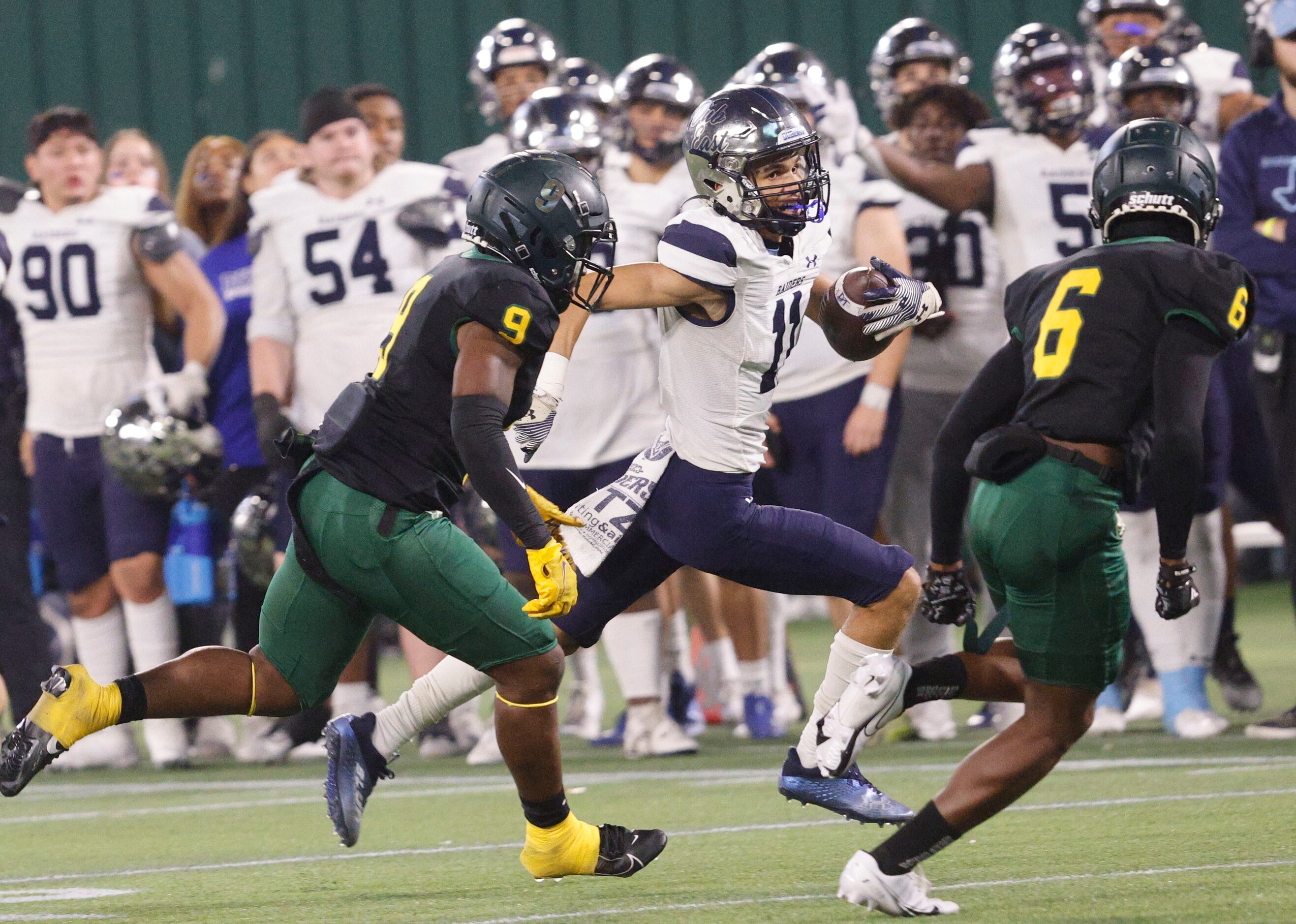 DeSoto's Jamari Laye (9) and DeSoto's Aundre Wisner (6) go to stop Wylie East's Amarean...