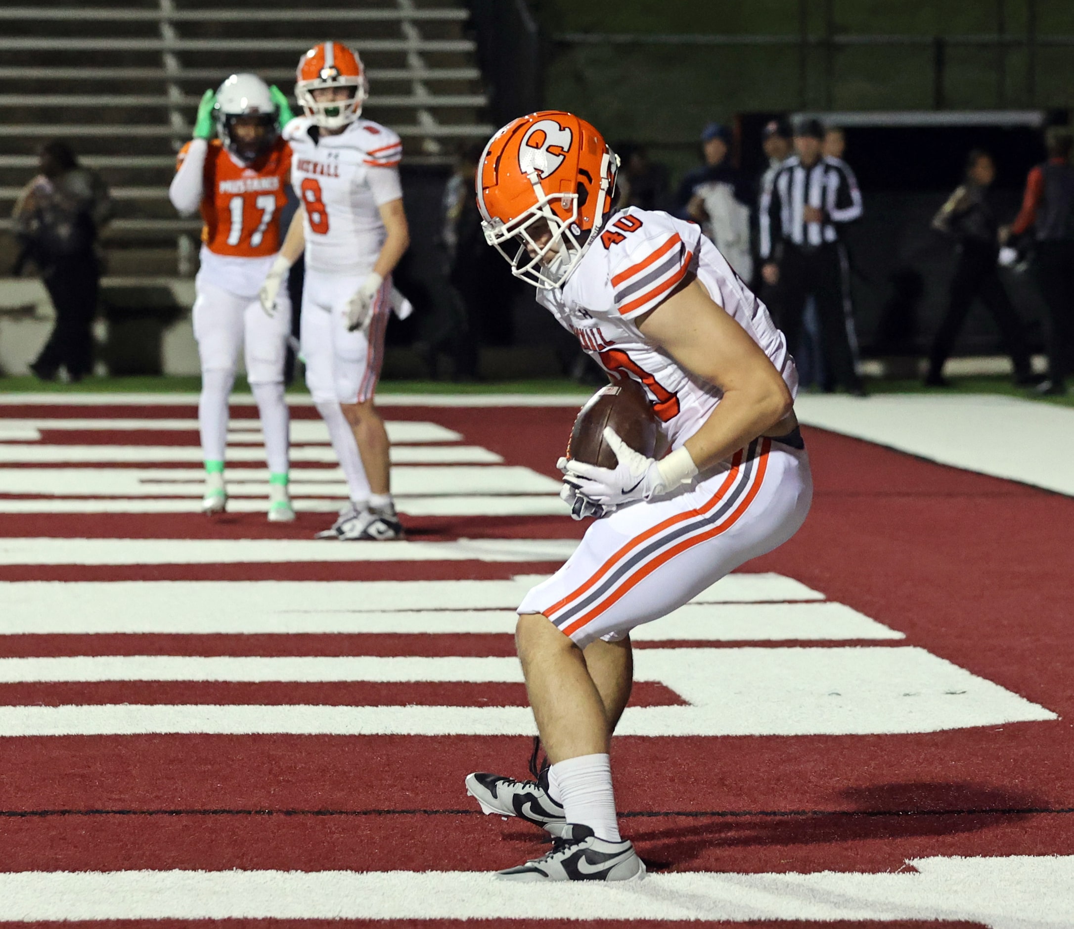 Rockwall High TE Jett Lamb (40) catches a touchdown pass during the first half of a high...