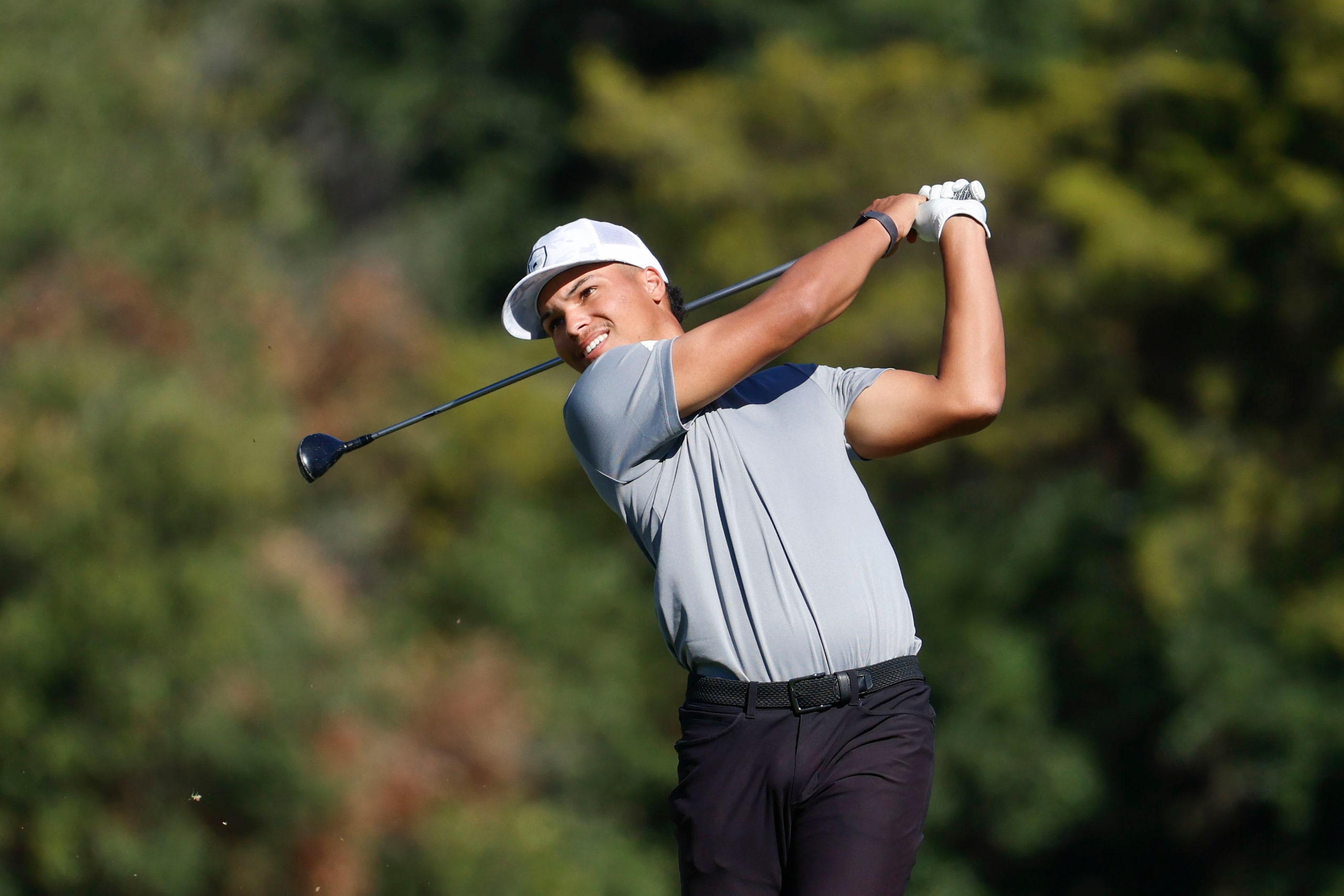 Xavier Bighaus of Colorado Christian University who grew up in Melissa, tees off on the...