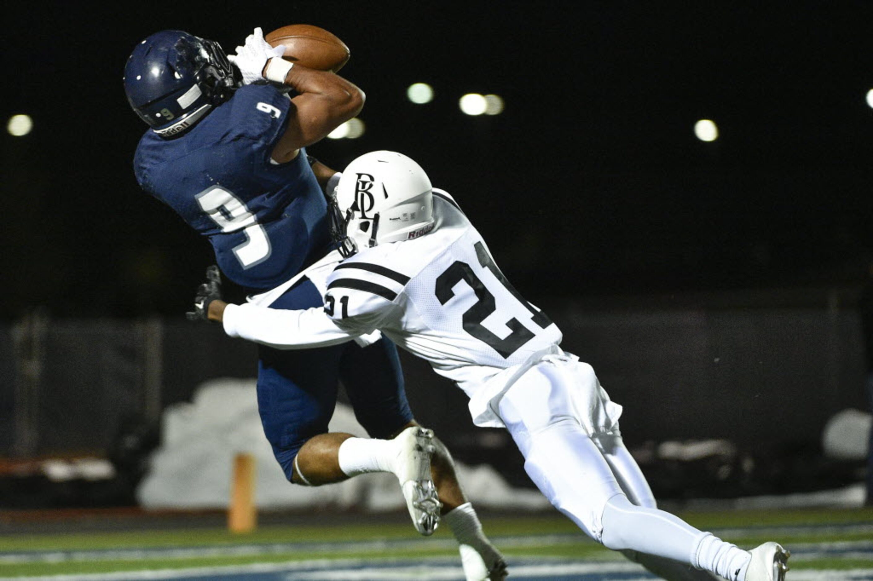 Liberty wide receiver Justus Lee (9) catches a touchdown pass during a high school football...