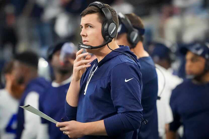Dallas Cowboys offensive coordinator Kellen Moore watches from the sidelines during the...