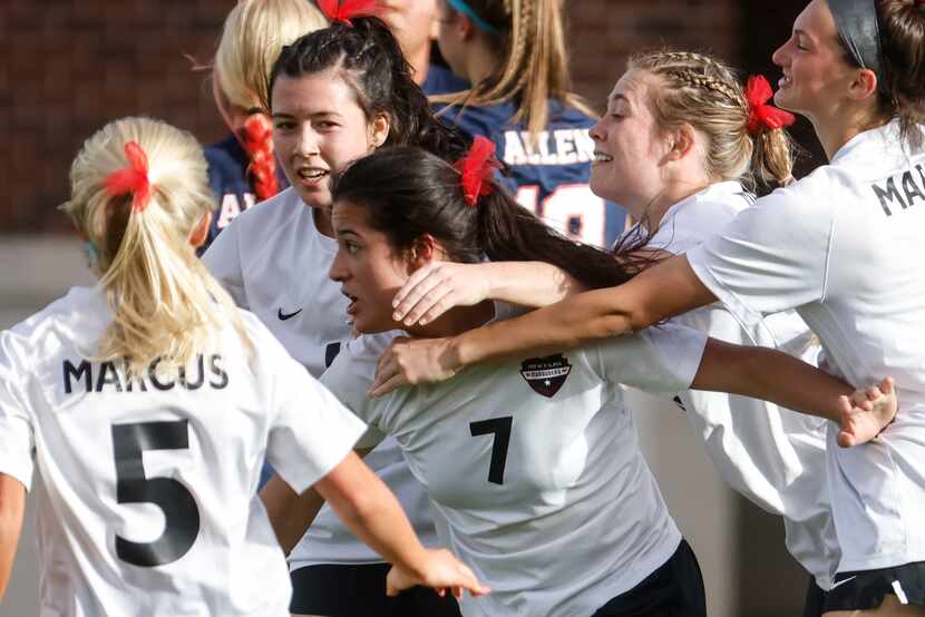 Marcus’ Bella Campos (7) celebrates after their first goal against Allen high during the...