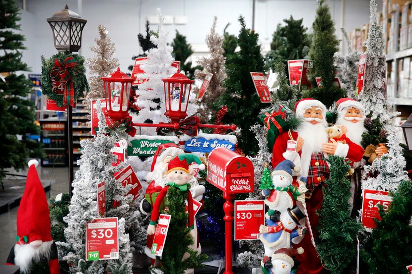 Christmas yard decorations and artificial trees fill the Walmart Supercenter on Lyndon B...