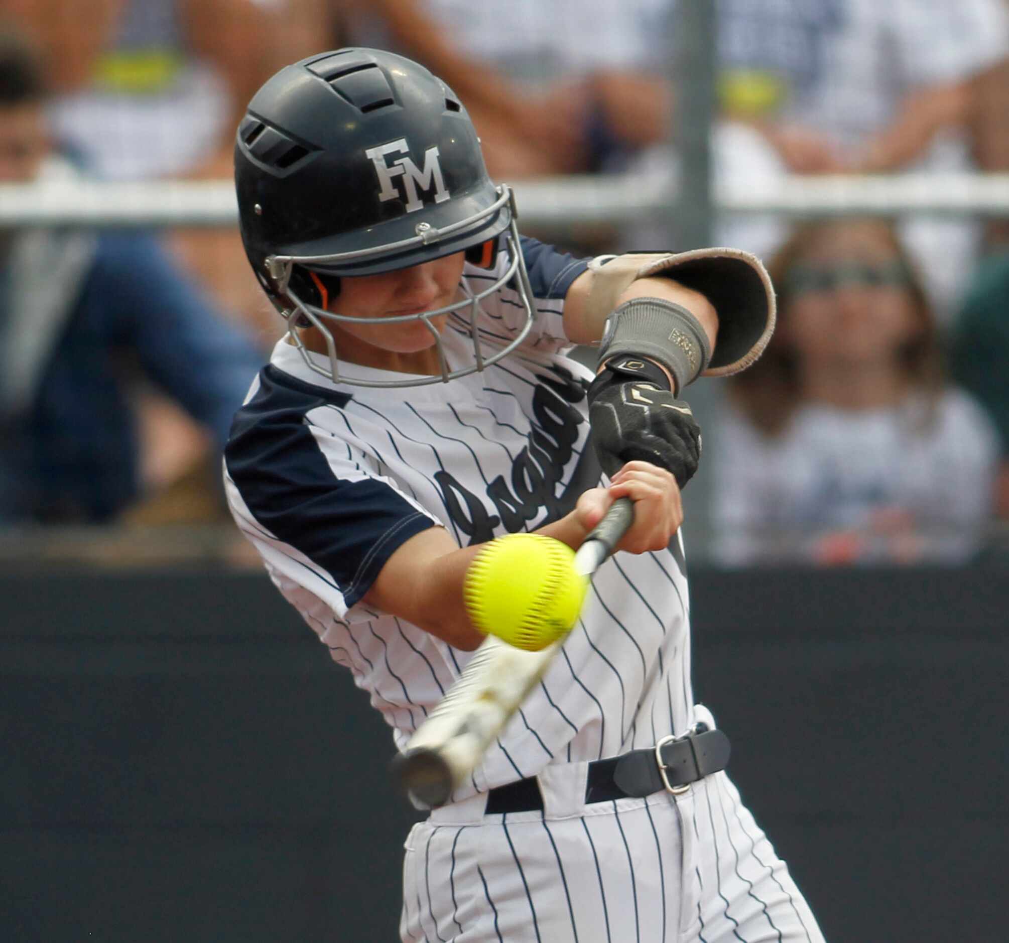 Flower Mound's McKenna Andrews (6) fouls off a pitch during the bottom of the first inning...