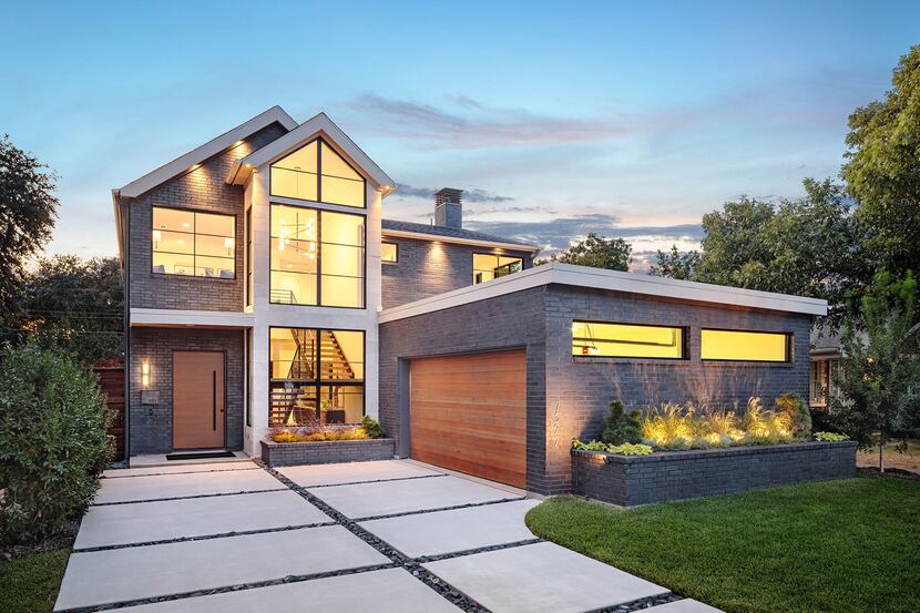 The new-construction smart home at 7527 Morton St. is by R.A. Millennium Properties. It is...