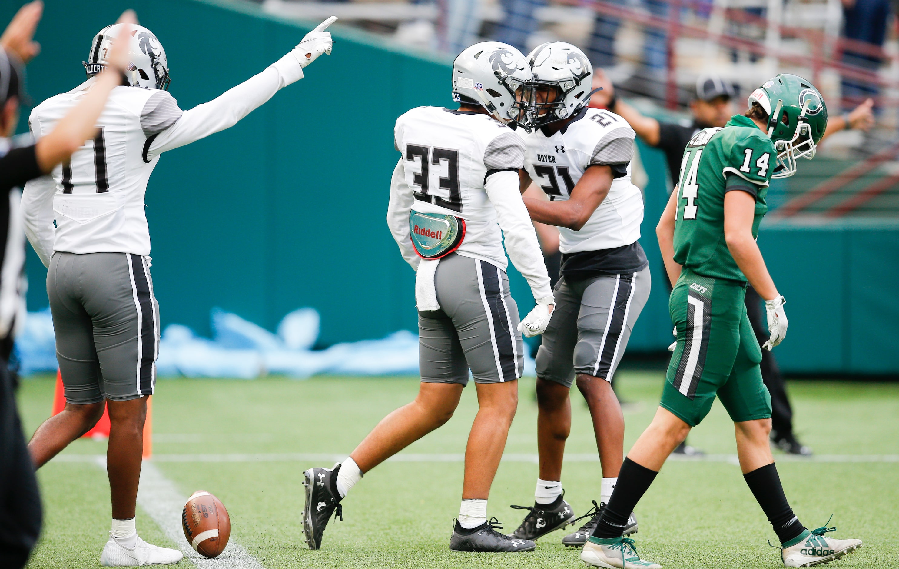 Denton Guyer junior safety Marquan Pope (33) is congratulated by sophomore cornerback Ryan...