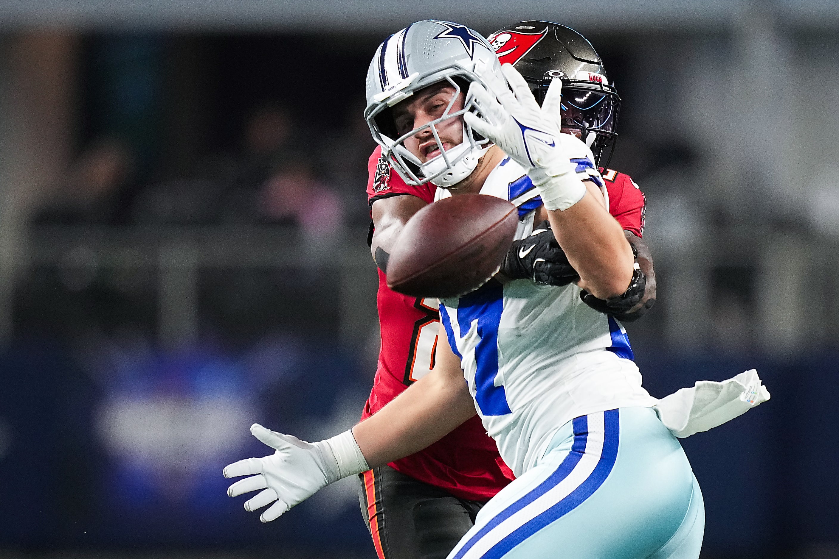 Tampa Bay Buccaneers safety Christian Izien (29) breaks up a pass intended for Dallas...