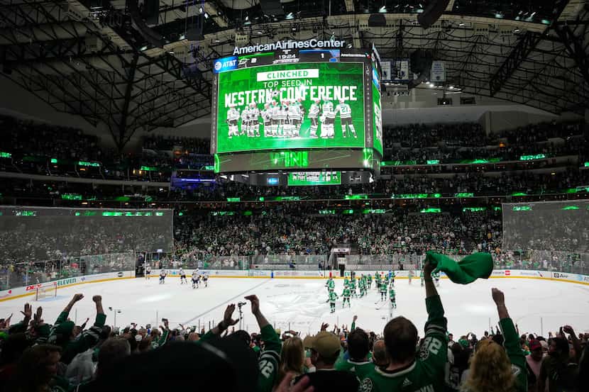 Dallas Stars fans and players celebrate after a shootout victory over the St. Louis Blues in...
