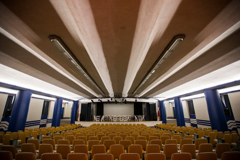 Refurbished theater seats sit in the Margaret & Al Hill Lecture Hall at the historic Hall of...