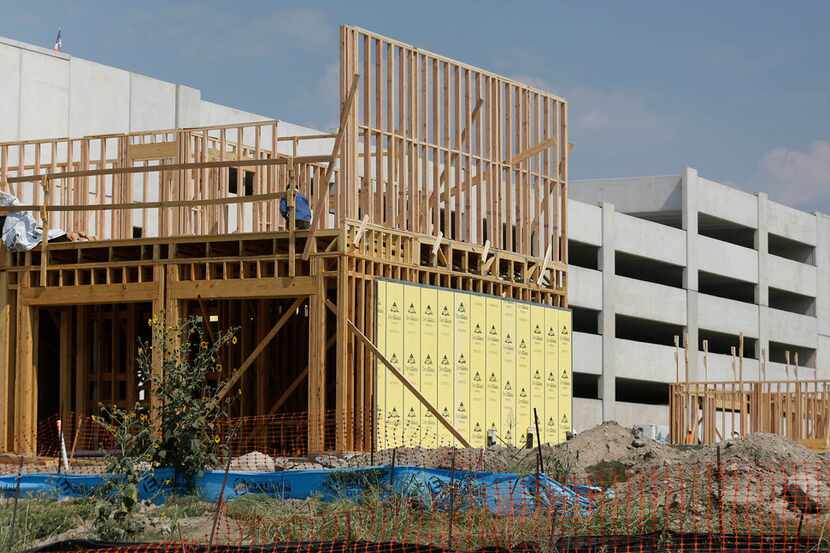 Construction continues on the Bayside development on the former Robertson Park in Rowlett,...
