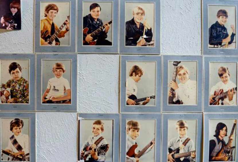 
Photos of former music students 


from the 1960s and ’70s hang on the wall at the store.


