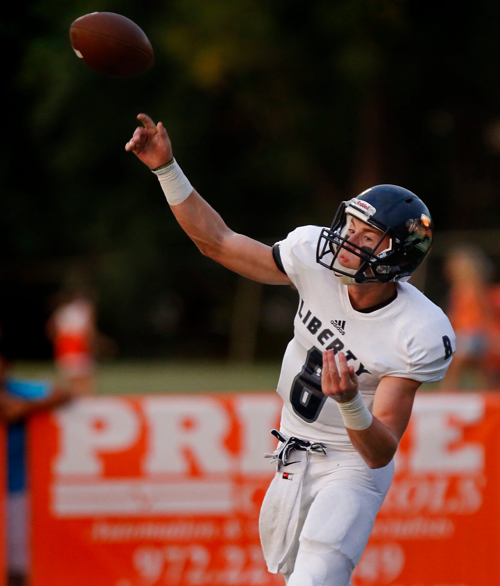 Liberty Christian quarterback Drew Hunnicutt (8) launches a pass against Celina High School...