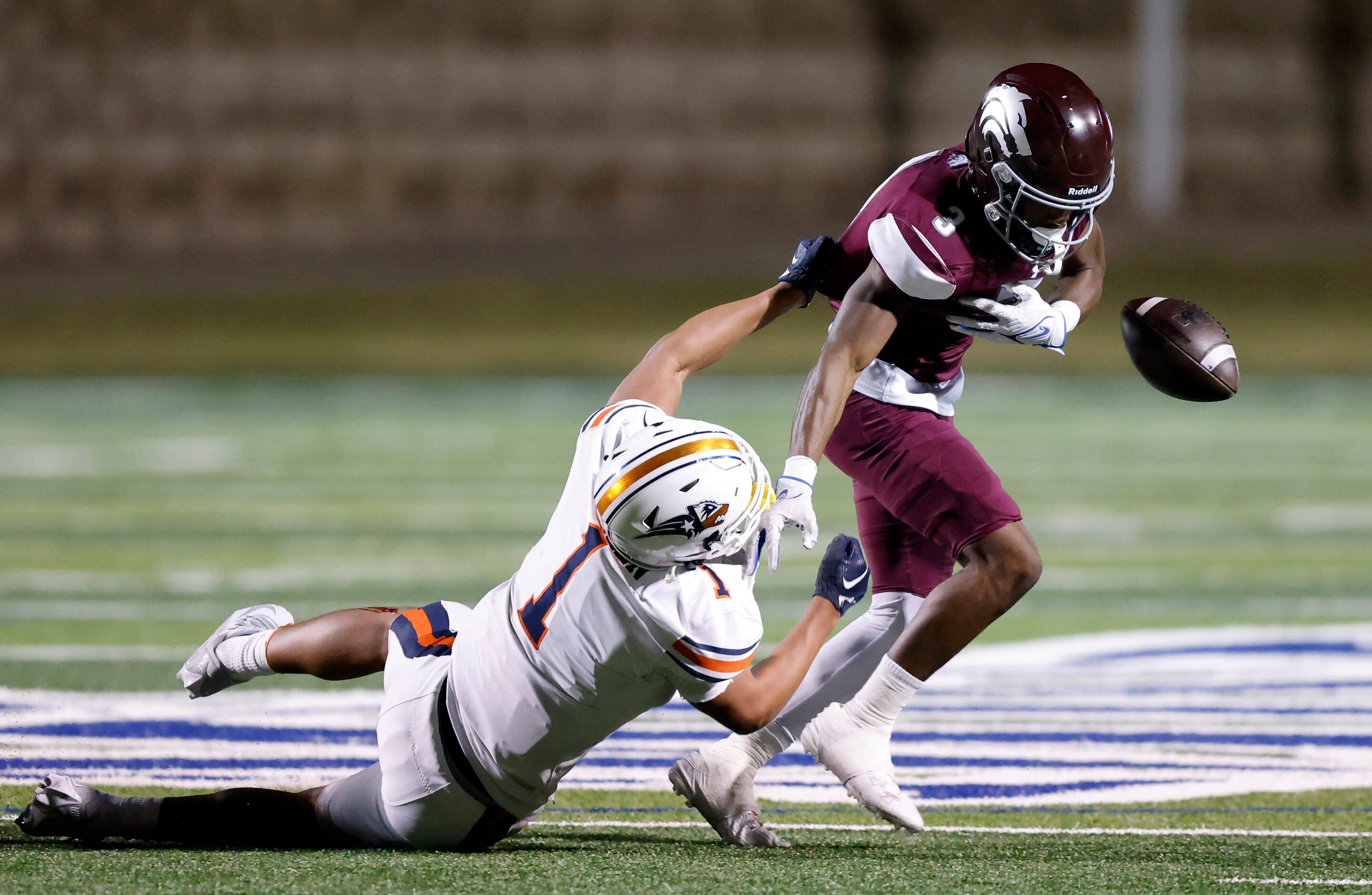 Frisco Wakeland linebacker Tristan Lawyer (1) forces Mansfield Timberview quarterback Tyler...