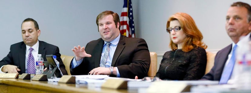 Council member David Heape  (second from left) talks during Tuesday’s City Council meeting....