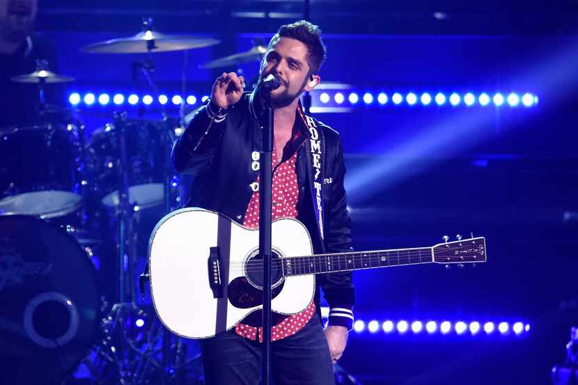 Thomas Rhett performs "Unforgettable" at the 51st annual CMA Awards at the Bridgestone Arena...