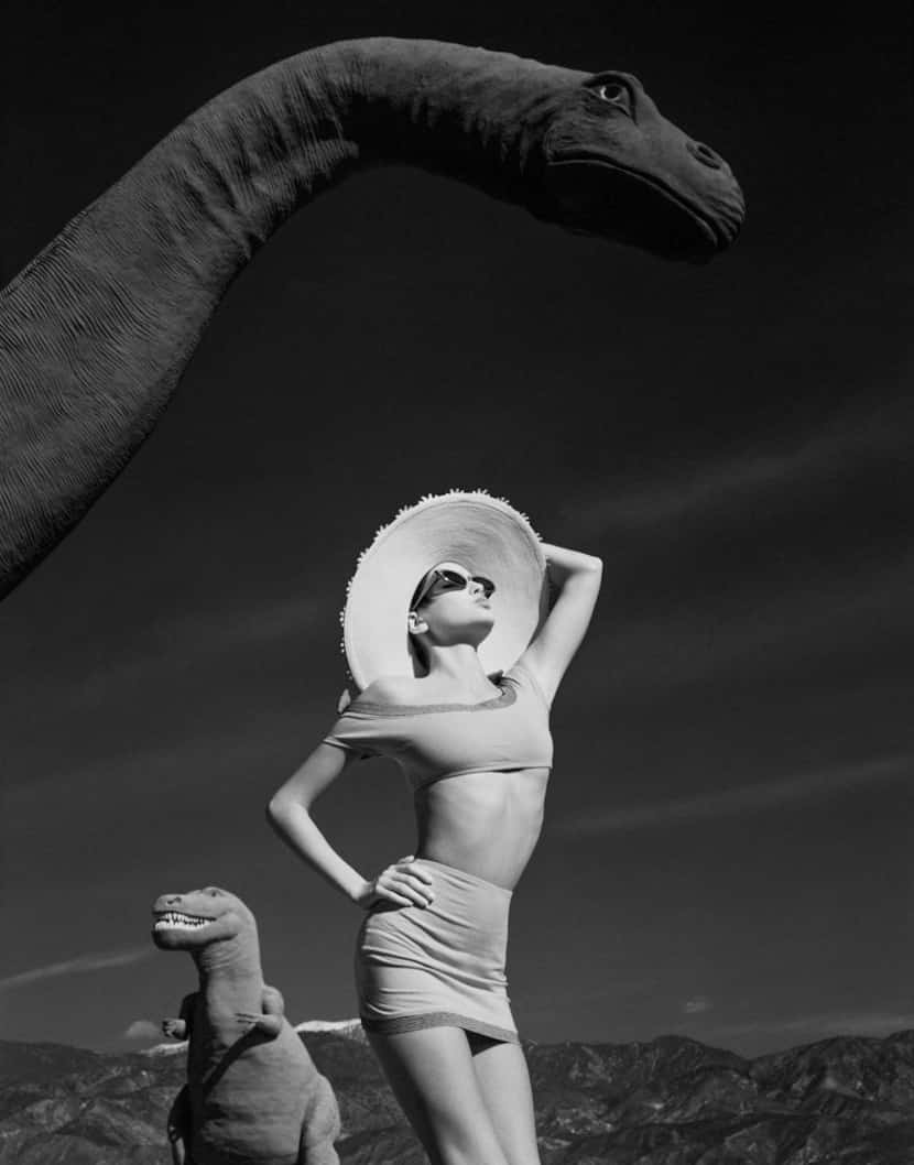 Model Chandra North was photographed with the Cabazon Dinosaurs outside Palm Springs for...