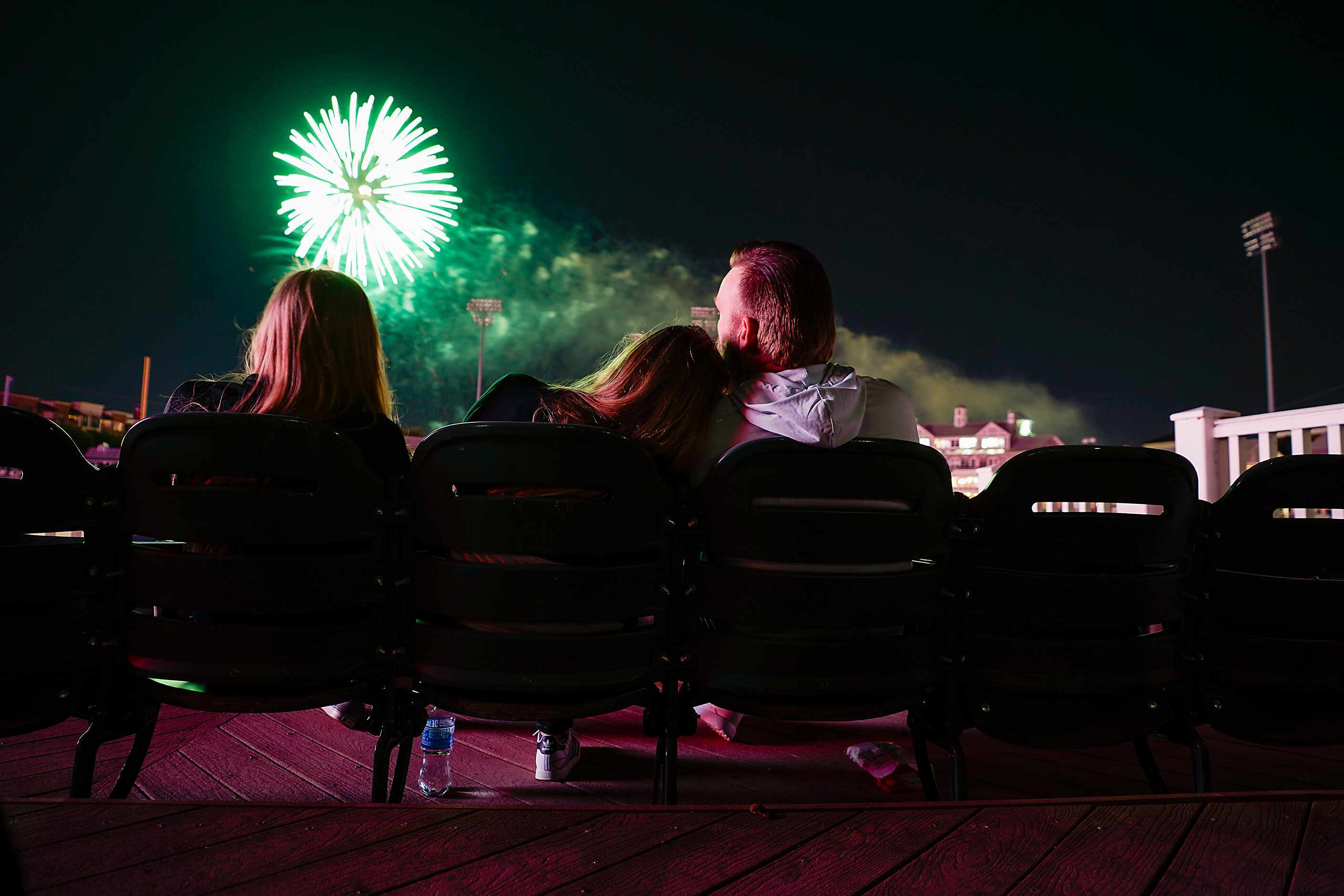 Fans watch the post game fireworks after the Frisco RoughRiders defeated the Midland...