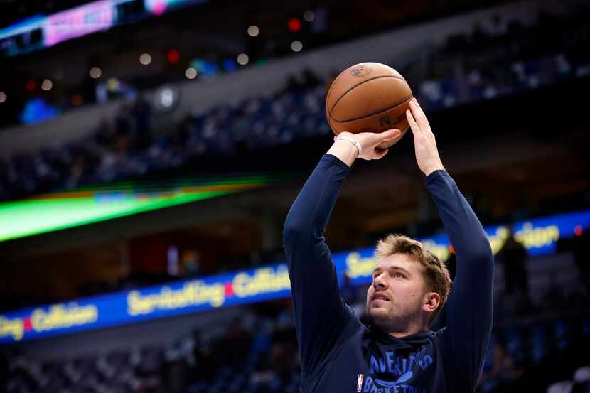 Dallas Mavericks guard Luka Doncic (77) warms up before Game 3 of the NBA Western Conference...