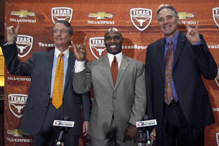 University of Texas president Bill Powers, left and athletic director Steve Patterson,...