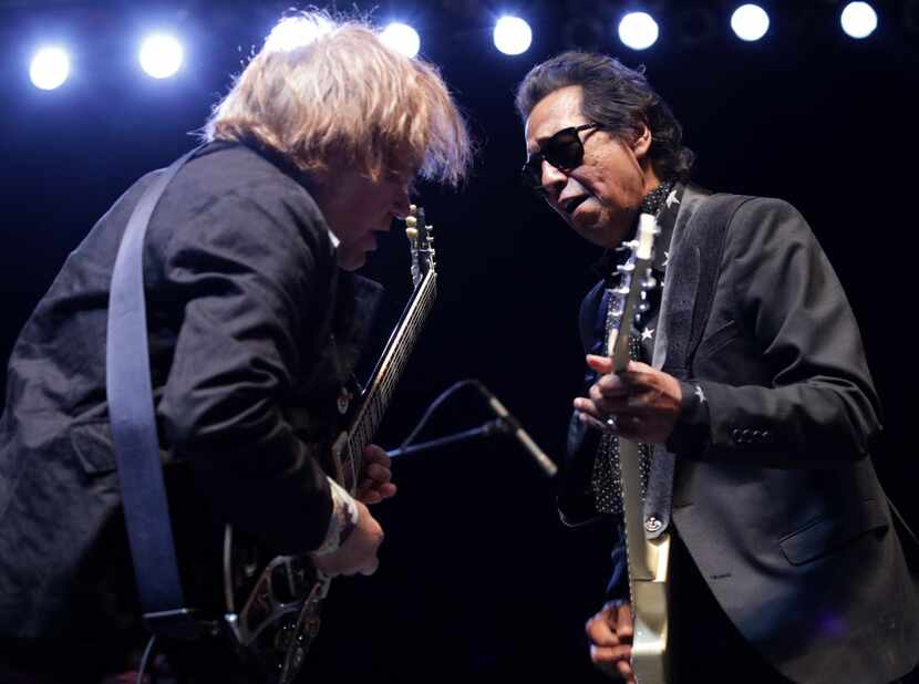 Alejandro Escovedo, right, performs with his band at Toyota Music Factory in Irving. The...