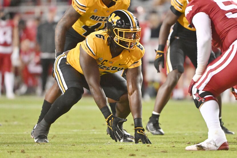 Missouri defensive lineman Darius Robinson (6) against Arkansas during an NCAA college...