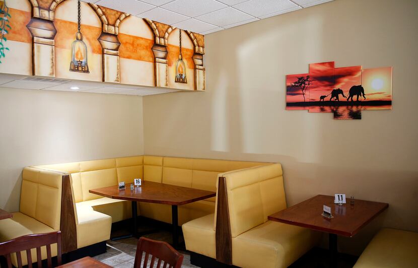 The dining area at Iby restaurant in Richardson is colorful and cozy.
