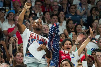 Simone Biles husband, Chicago Bears safety Jonathan Owens, cheer her performance on the...