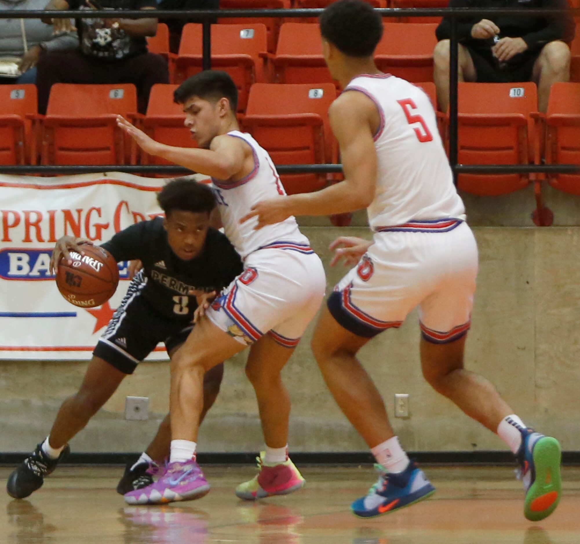 Odessa Permian guard Shy Stephens Deary (3) looks for an escape path as he is trapped by...